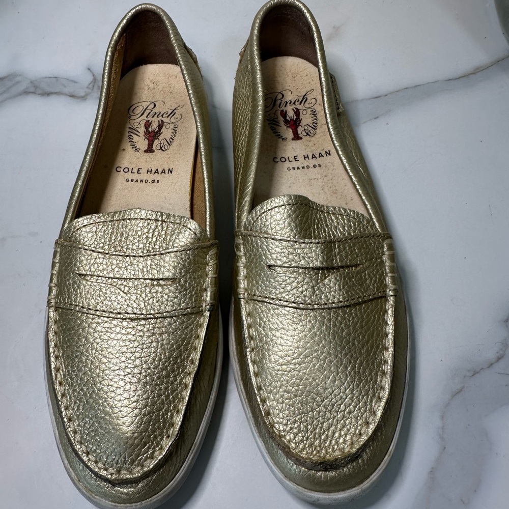 Cole Haan gold penny loafers size 7 1/2